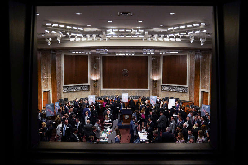 © Reuters. People attend the Executive Branch Job Fair hosted by the Conservative Partnership Institute at the Dirksen Senate Office Building in Washington