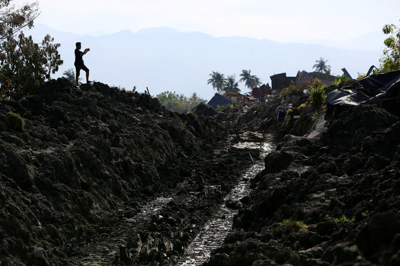 © Reuters. Casas destruídas por terremoto em Petobo, Palu, na Indonésia