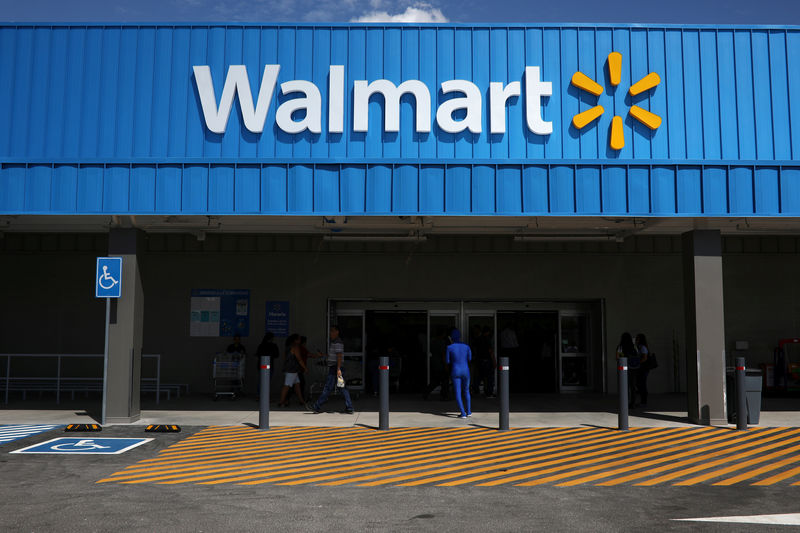 © Reuters. FILE PHOTO: The logo of Walmart is seen outside of a new Walmart Store in San Salvador