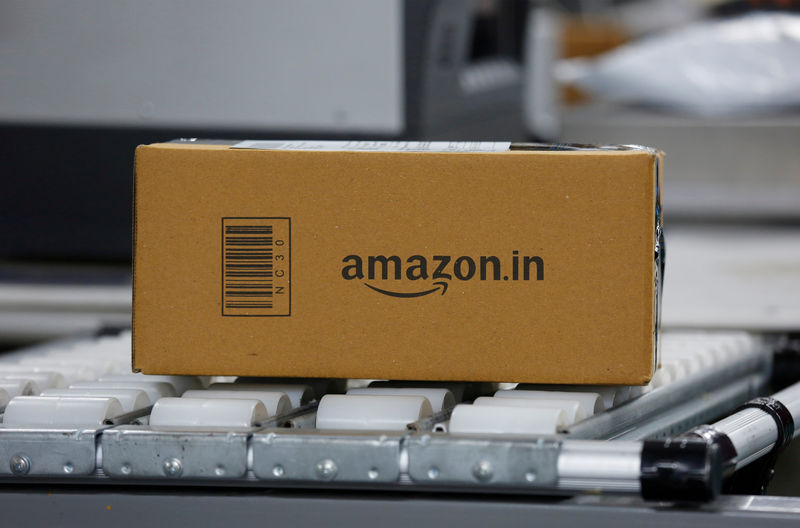© Reuters. FILE PHOTO: A parcel on a conveyor belt at an Amazon fulfillment centre on the outskirts of Bengaluru