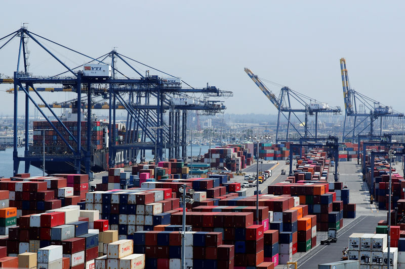 © Reuters. Ship and containers are shown at the port of Los Angeles in Los Angeles, California,