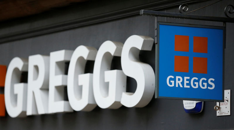 © Reuters. FILE PHOTO: A sign outside a Greggs bakery in Bradford