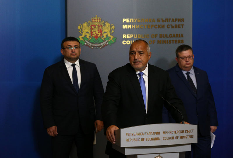 © Reuters. Bulgarian Prime Minister Borissov speaks next to Chief Prosecutor Tsatsarov and Interior Minister Marinov in Sofia