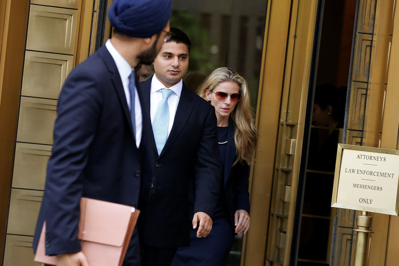 © Reuters. Rohan Ramchandani, former London-based trader for Citigroup Inc, exits the U.S. Federal Court in Manhattan following a hearing for conspiring to rig prices in the foreign exchange market in New York