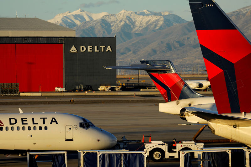 © Reuters. FILE PHOTO: A Delta Air Lines flight is pushed put of its gate at the airport in Salt Lake City