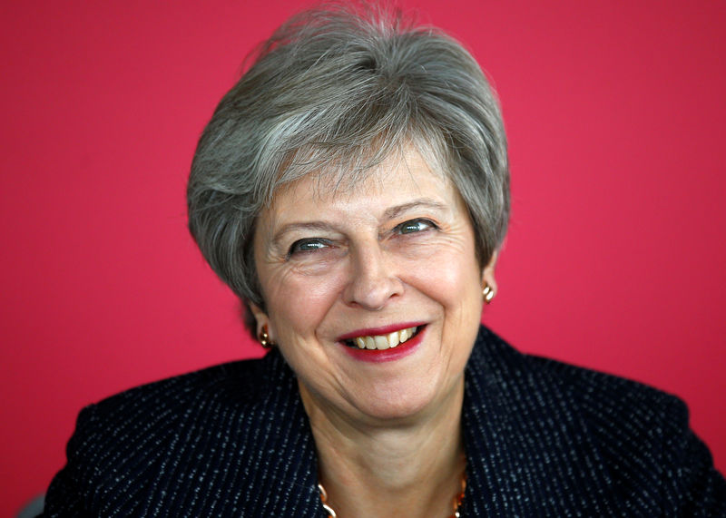 © Reuters. Britain's Prime Minister Theresa May attends a roundtable meeting with business leaders, whose companies are inaugural signatories of the Race at Work Charter, at the Southbank Centre in London