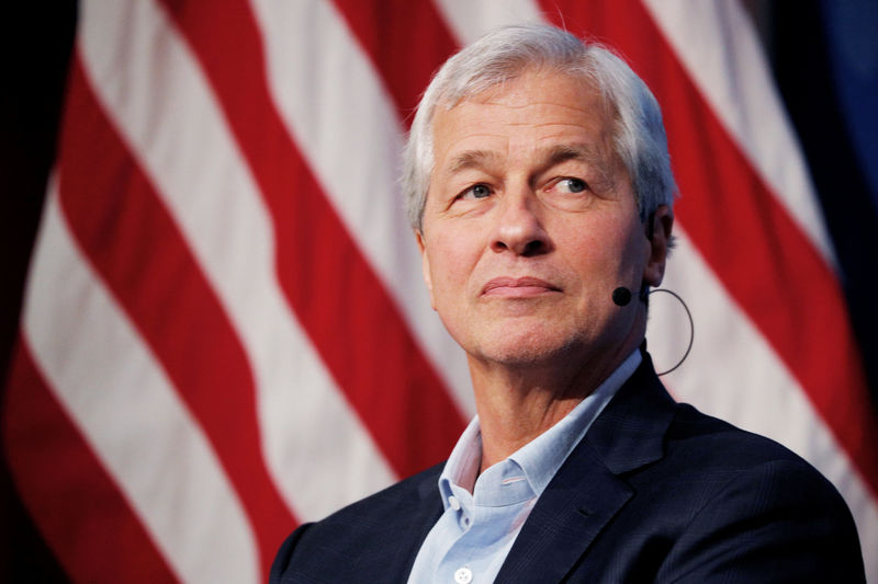 © Reuters. FILE PHOTO:    Dimon, CEO of JPMorgan Chase, takes part in a panel discussion about investing in Detroit at the Kennedy School of Government at Harvard University in Cambridge