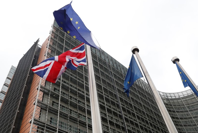 © Reuters. The British flag flies next to European flags at the European Commission in Brussels
