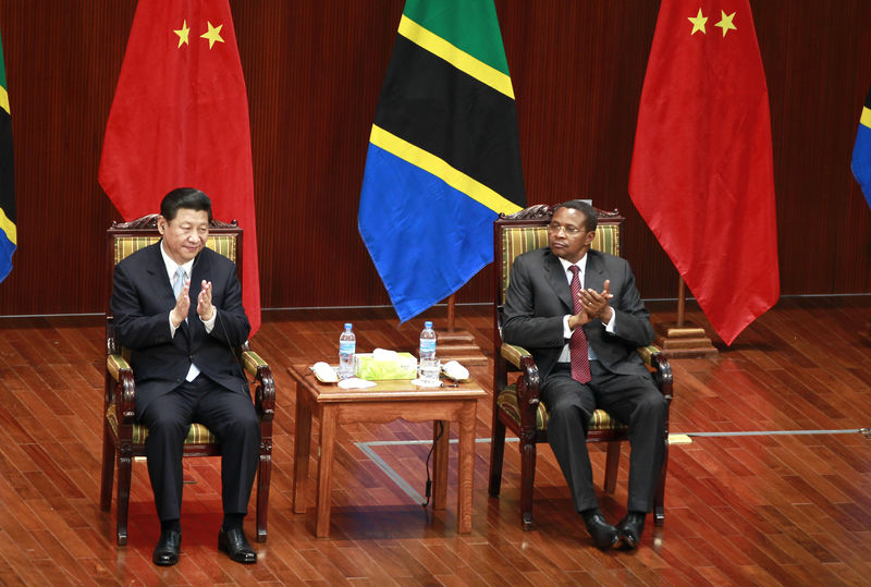 © Reuters. China's President Xi and his Tanzanian counterpart Kikwete attend the opening ceremony of the Julius Nyerere International Convention Centre in Dar es Salaam