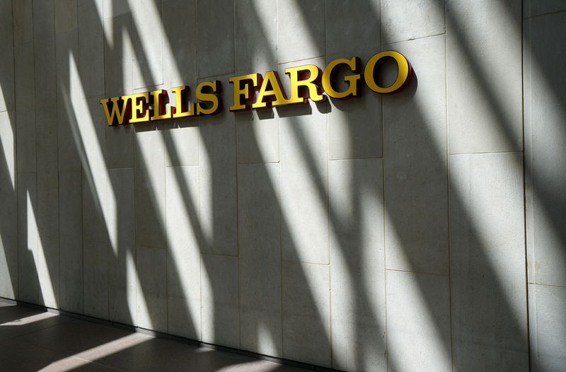 © Reuters. FILE PHOTO: The sign outside the Wells Fargo & Co. bank in downtown Denver