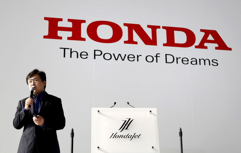 © Reuters. FILE PHOTO: Honda Aircraft Company's President and Chief Executive Officer Fujino speaks during news conference after HondaJet makes its first appearance in Japan at Haneda Airport in Tokyo