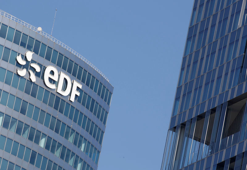 © Reuters. FILE PHOTO: The logo of Electricite de France SA (EDF) is pictured on the facade of a building in Paris