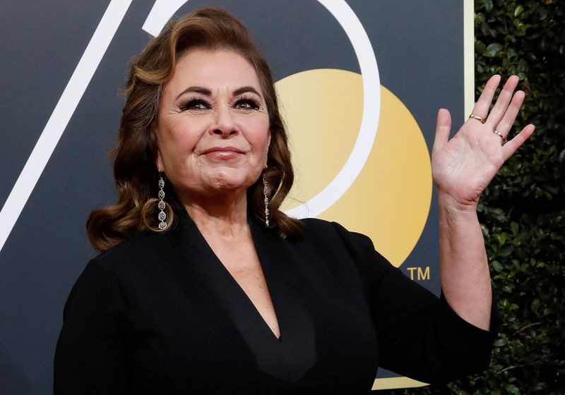 © Reuters. FILE PHOTO: Actress Roseanne Barr waves on her arrival to the 75th Golden Globe Awards in Beverly Hills