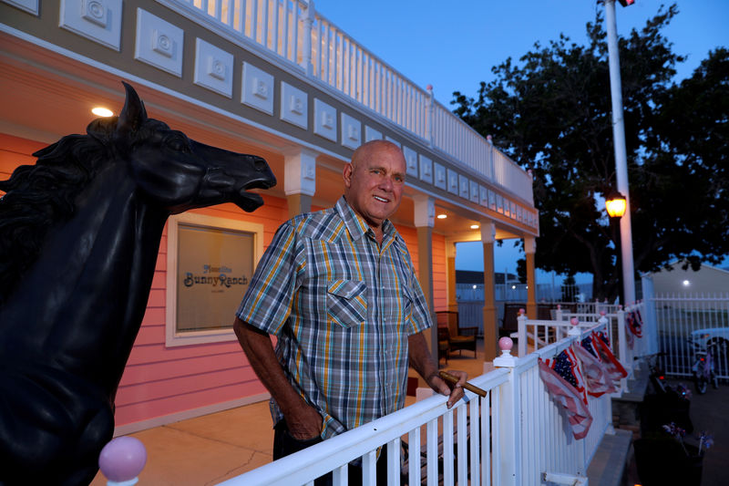 © Reuters. FILE PHOTO: Dennis Hof, owner of the Moonlite BunnyRanch legal brothel and recent winner of the Republican primary election for Nevada State Assembly District 36, poses outside the brothel in Mound House, Nevada