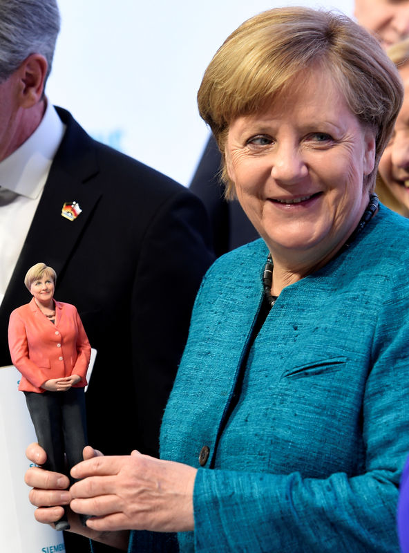 © Reuters. FILE PHOTO: Media tour at Hannover Fair, the world's biggest industrial fair in Hanover