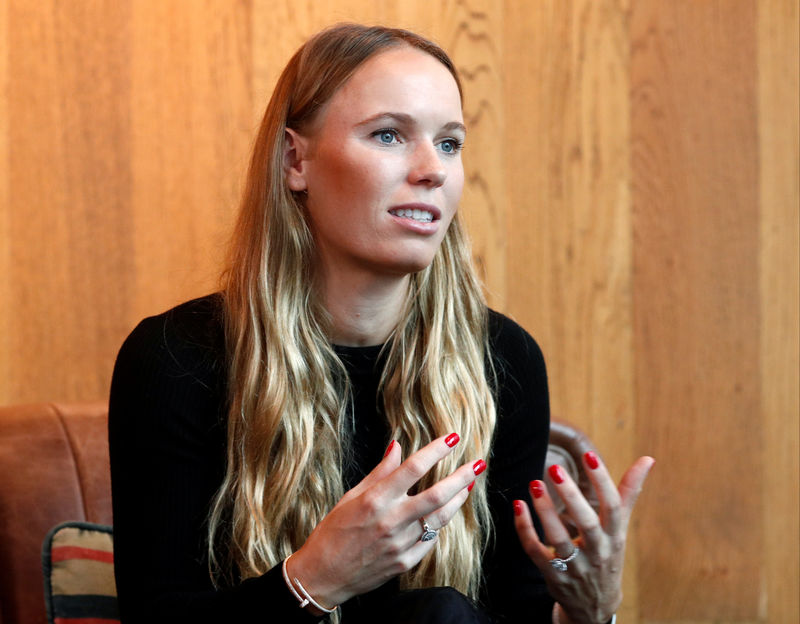 © Reuters. Tennis player Caroline Wozniacki speaks to Reuters after attending a signing ceremony with GCOX Global Crypto Offering Exchange to launch her own cryptocurrency in Singapore