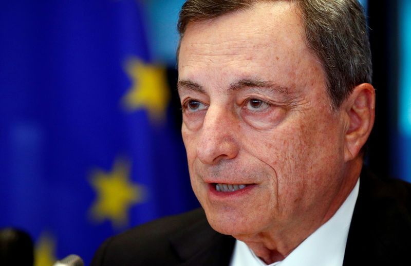 © Reuters. FILE PHOTO: ECB President Draghi testifies before the EU Parliament's Economic and Monetary Affairs Committee in Brussels