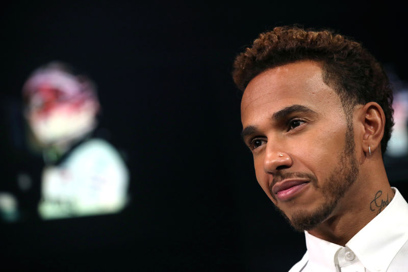 © Reuters. FILE PHOTO: Mercedes' Lewis Hamilton speaks ahead of the United States Grand Prix in New York City