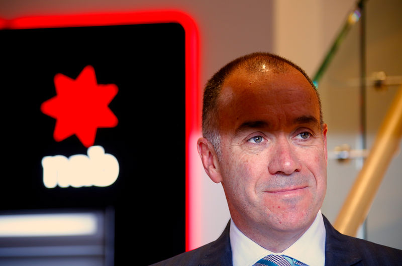 © Reuters. FILE PHOTO: National Australia Bank (NAB) CEO Andrew Thorburn poses for photographs during an official event at a branch in central Sydney