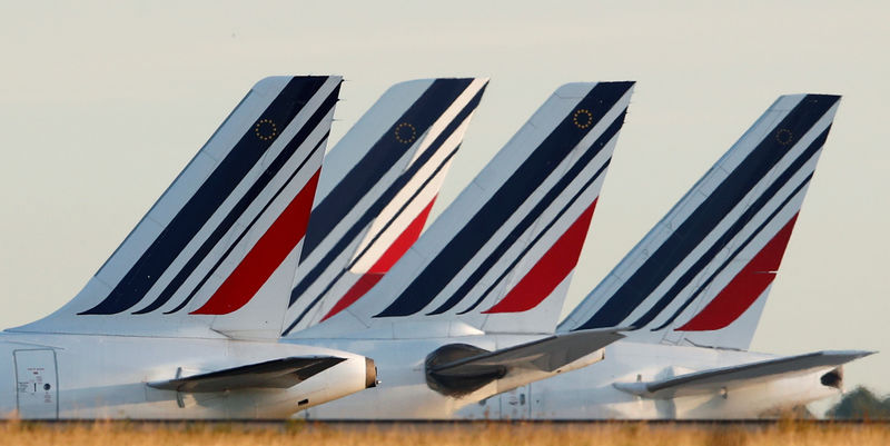 © Reuters. Tails of Air France airplanes are seen at the Charles-de-Gaulle airport in Roissy