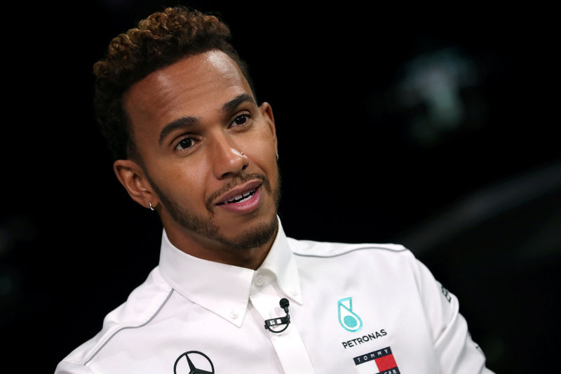 © Reuters. Mercedes' Lewis Hamilton speaks ahead of the United States Grand Prix in New York City