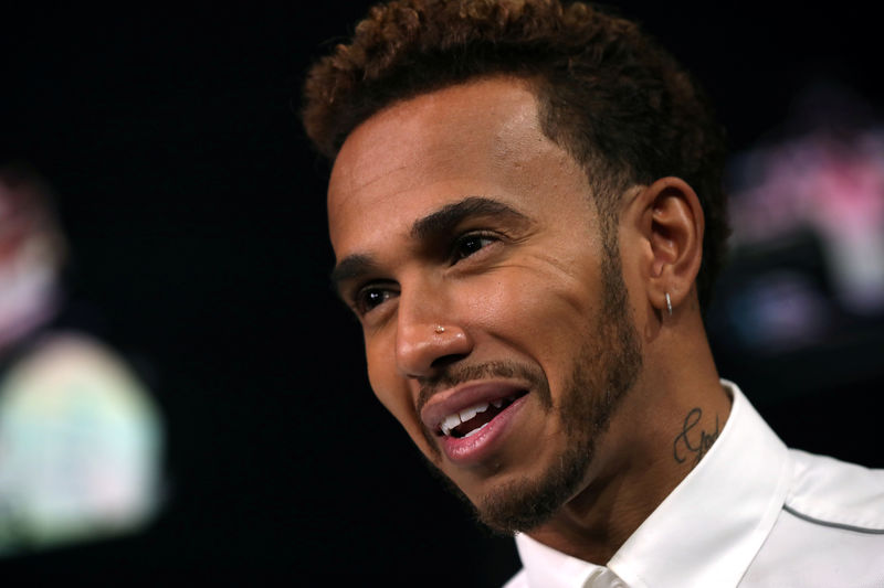 © Reuters. Mercedes' Lewis Hamilton speaks ahead of the United States Grand Prix in New York City