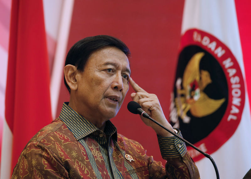 © Reuters. Indonesia Chief Security Minister Wiranto delivers a speech during a meeting between former militants and victims in Jakarta