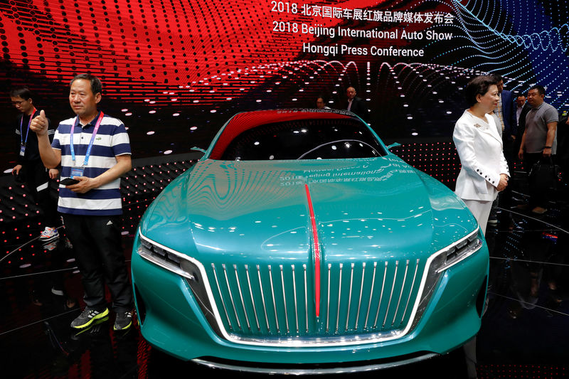 © Reuters. FILE PHOTO: A concept car is displayed at the booth of FAW Group car brand Hongqi during a media preview of the Auto China 2018 motor show in Beijing