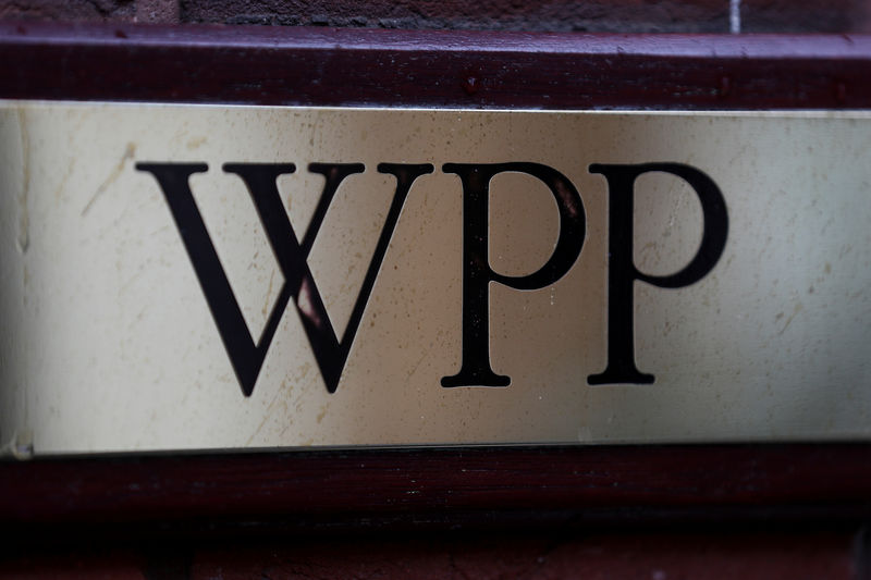 © Reuters. FILE PHOTO: A logo hangs on the wall outside the WPP offices in London
