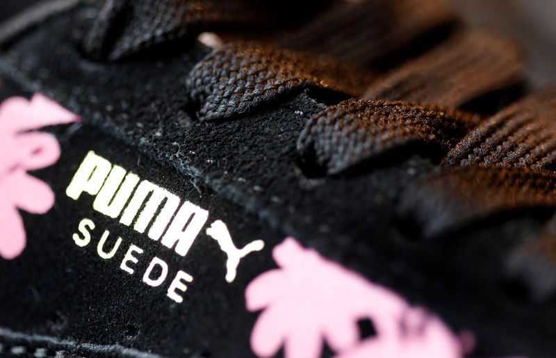 © Reuters. FILE PHOTO: A Puma shoe is pictured after the company's annual news conference in Herzogenaurach