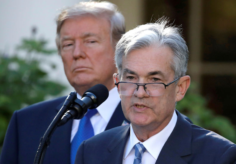 © Reuters. FILE PHOTO: FILE PHOTO: U.S. President Donald Trump looks on as Jerome Powell, his nominee to become chairman of the U.S. Federal Reserve, speaks at the White House in Washington