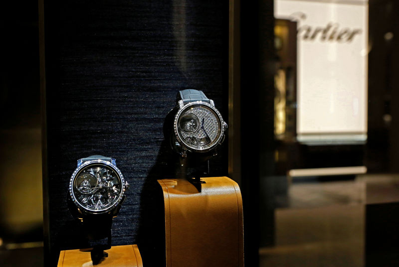 © Reuters. Watches models by Cartier are pictured during the opening day of the SIHH fair in Geneva