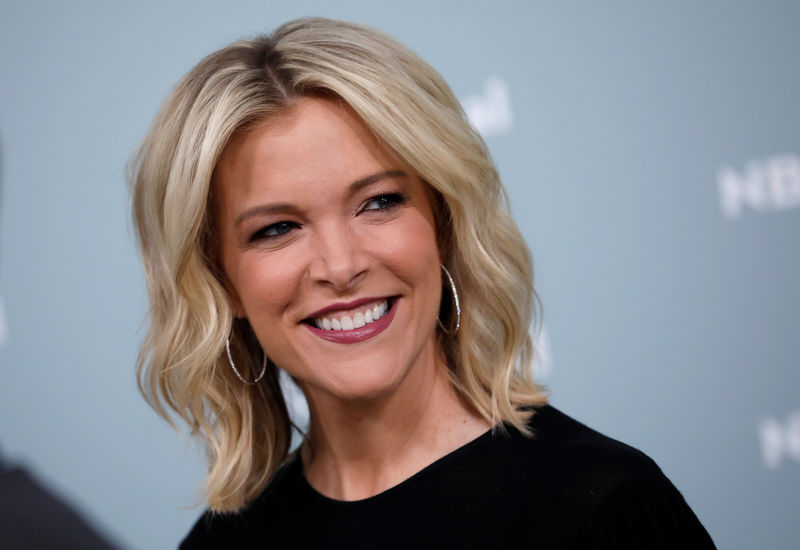 © Reuters. NBC News personality Megyn Kelly poses for photographers at the NBCUniversal UpFront presentation in New York City