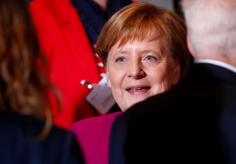 © Reuters. German Chancellor Merkel speaks to participants of the national integration prize at the Chancellery in Berlin