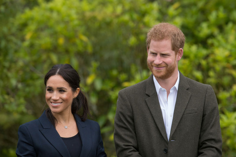 © Reuters. Meghan derrota al príncipe Enrique en una competición de botas de lluvia en Nueva Zelanda