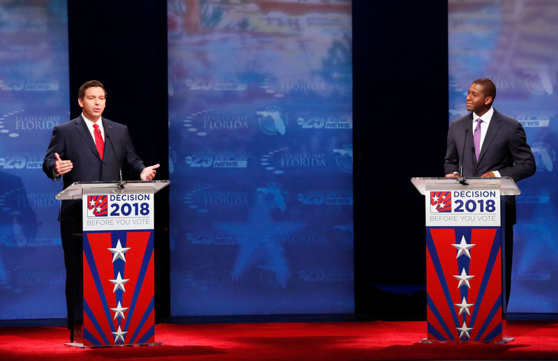 © Reuters. Candidatos a governador da Flórida Ron DeSantis e Andrew Gillum