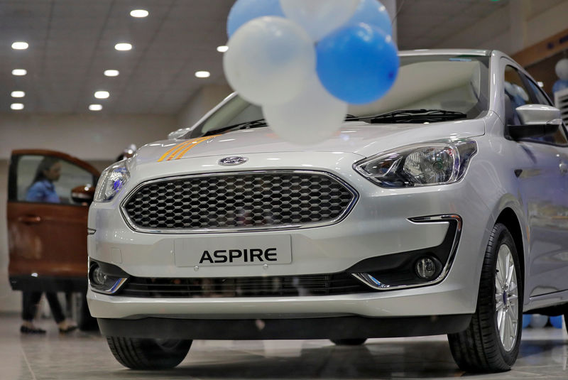 © Reuters. A new Ford Aspire car is on display for sale inside a showroom in New Delhi