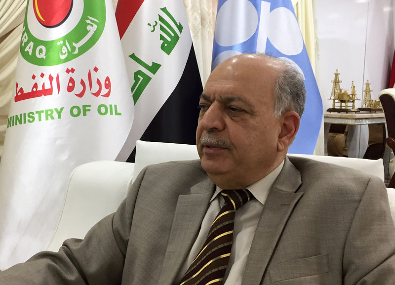 © Reuters. Iraq's oil minister Thamer Ghadhban speaks during an interview with Reuters at the oil ministry in Baghdad