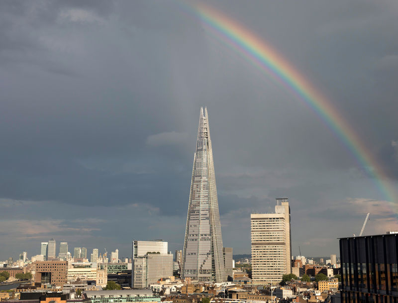 © Reuters. FILE PHOTO: A rainbow is seen over the Shard building in central London