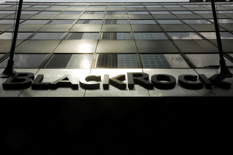 © Reuters. FILE PHOTO: A sign for BlackRock Inc hangs above its building in New York