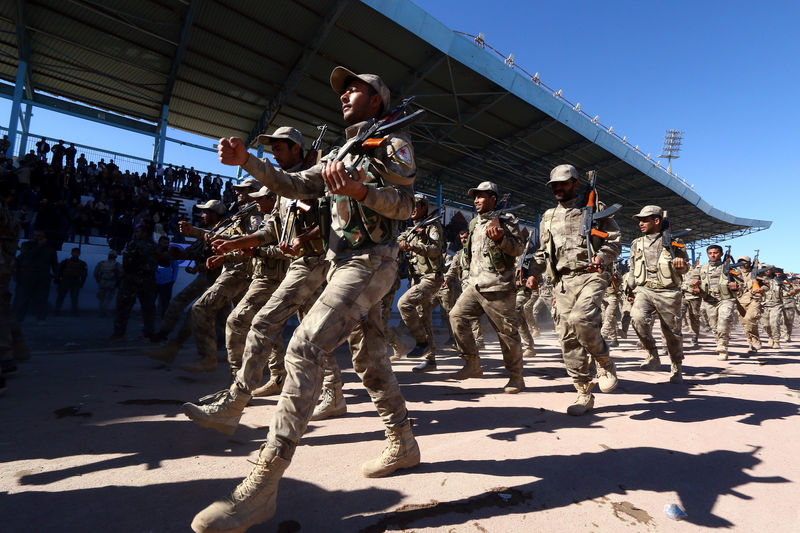 © Reuters. Militares sírios em Raqqa