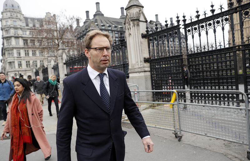 © Reuters. FILE PHOTO: British Member of Parliament Tobias Ellwood walks past Carriage Gates as he arrives at the Houses of Parliament, following a recent attack in Westminster, London