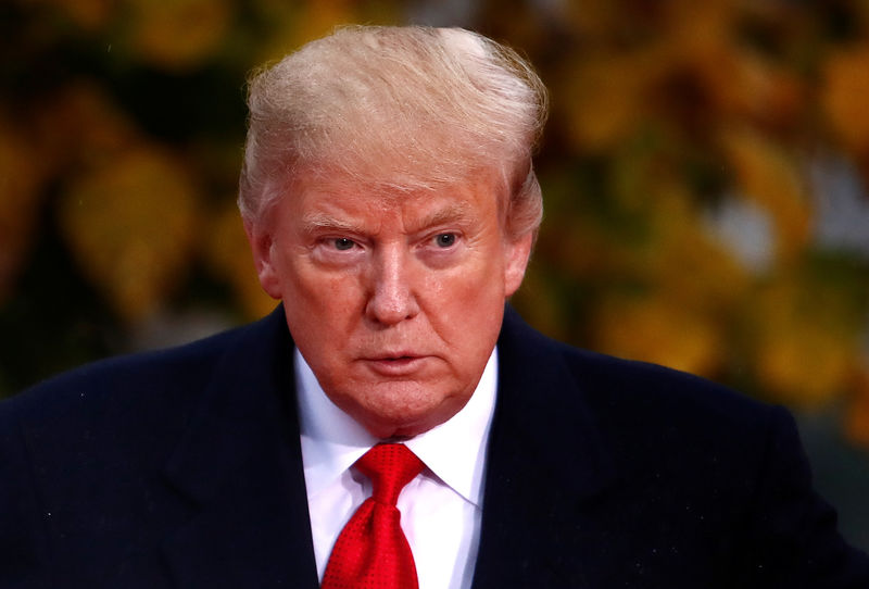 © Reuters. FILE PHOTO - U.S. President Donald Trump visits the Suresnes American Cemetery as part of the Paris commemoration ceremony for Armistice Day,