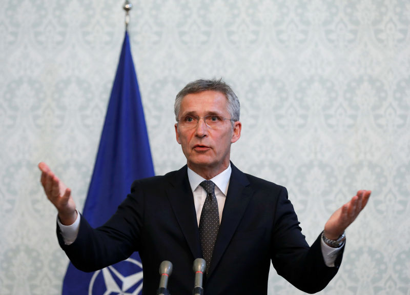 © Reuters. NATO Secretary General Jens Stoltenberg speaks during a joint news conference with Afghanistan's President Ashraf Ghani in Kabul