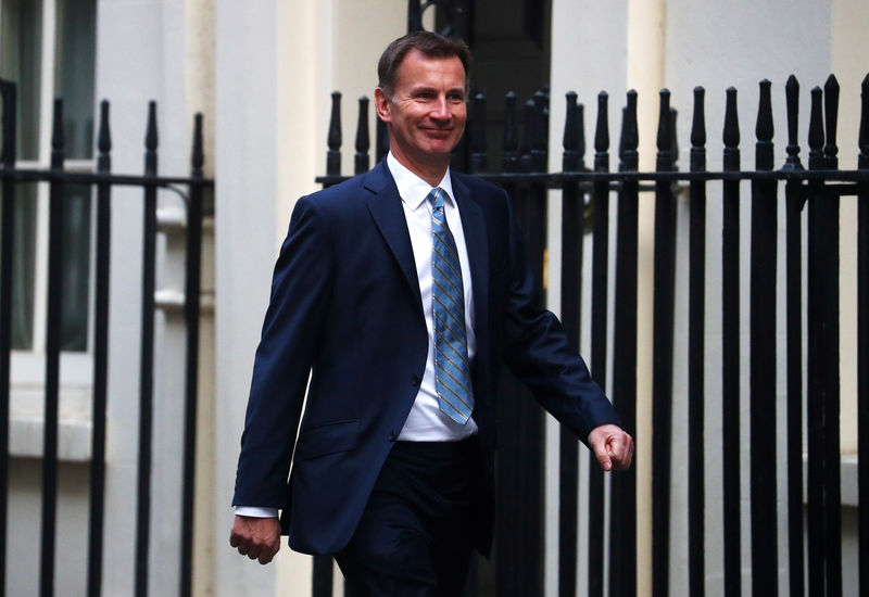 © Reuters. FILE PHOTO: Britain's Foreign Secretary Jeremy Hunt arrives in Downing Street, London