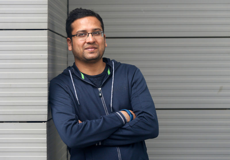 © Reuters. FILE PHOTO - Bansal, Group CEO of Flipkart, poses at the company's HQ in Bengaluru