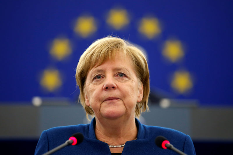 © Reuters. German Chancellor Merkel addresses the European Parliament during a debate on the future of Europe at the European Parliament in Strasbourg