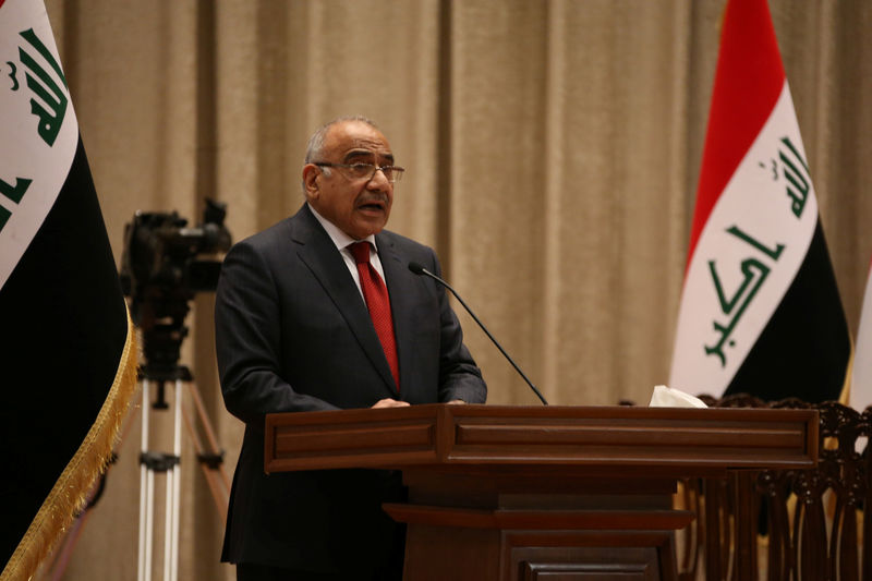 © Reuters. Iraq's Prime Minister-designate Adel Abdul Mahdi speaks to parliament he announces his new cabinet at the parliament headquarters in Baghdad