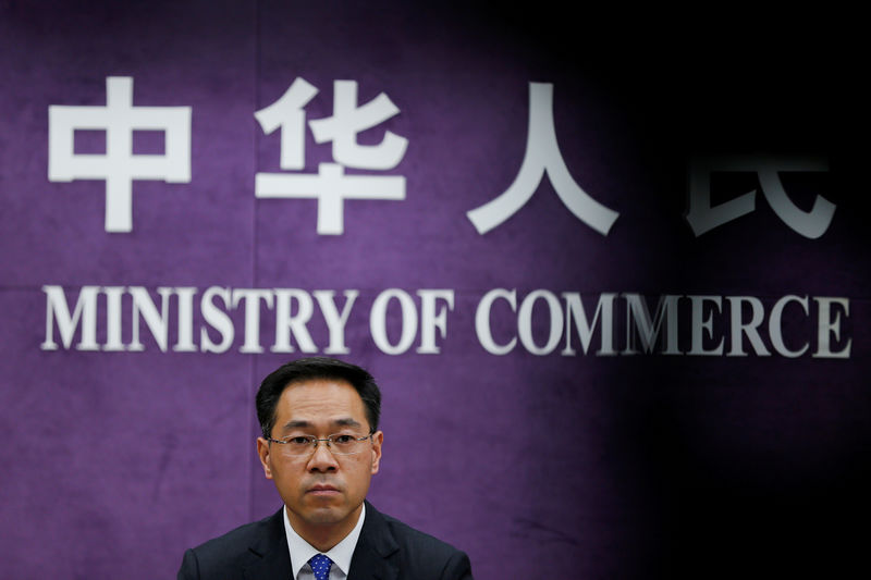 © Reuters. China's Ministry of Commerce spokesperson Gao Feng attends a news conference at the commerce ministry in Beijing