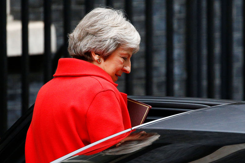 © Reuters. Britain's Prime Minister, Theresa May, leaves 10 Downing Street, to make a statement in the House of Commons, in London